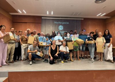 Foto de grupo con los asistentes al taller de preparación de materiales para el eclipse en Mieres